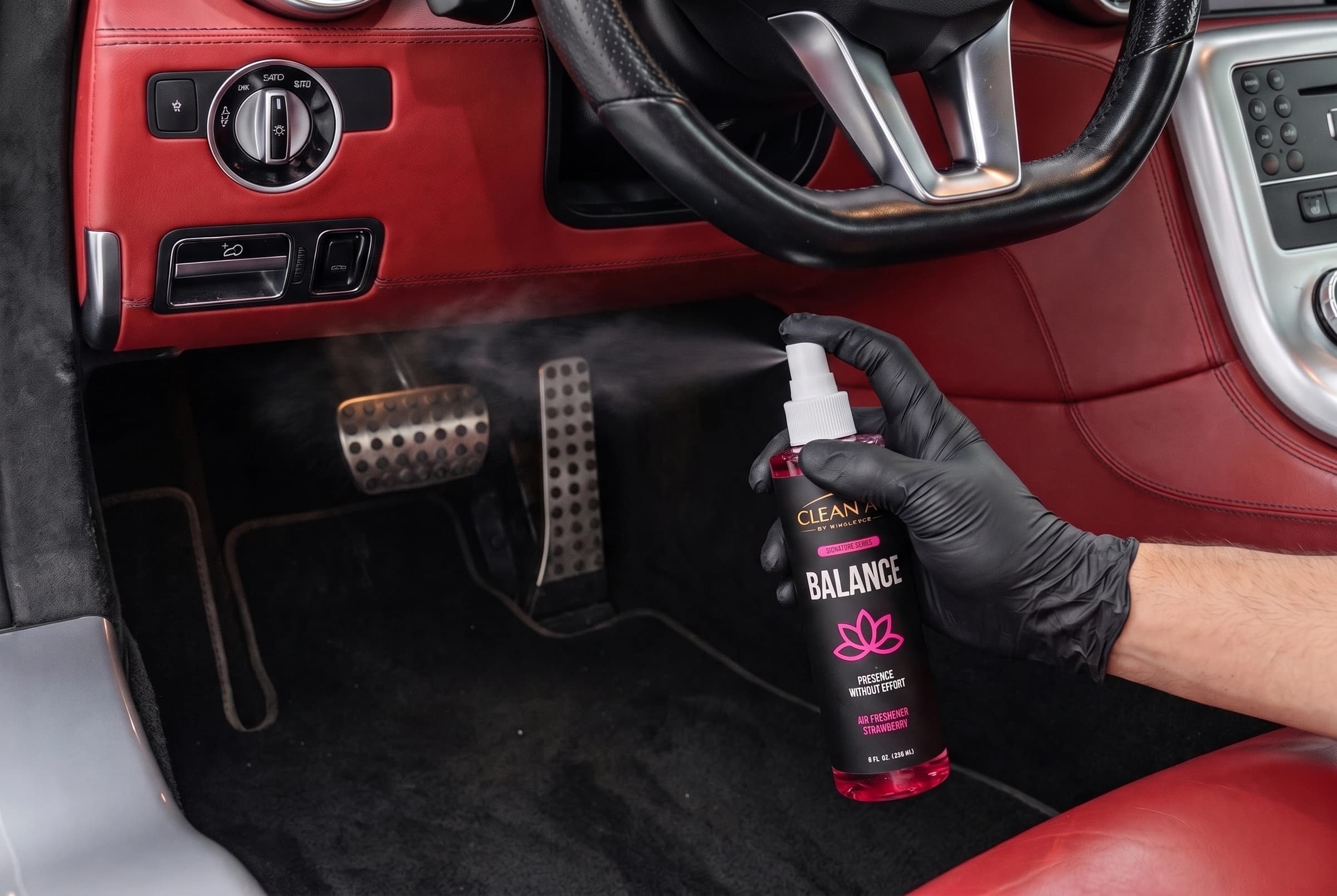 The original BALANCE finger pump spraying beneath the dashboard into the air above the pedals